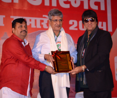 Being facilitated by celebrity Mr. Mukesh Khanna during Award show.